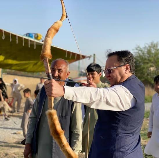Traditional archery training led by senior mentor